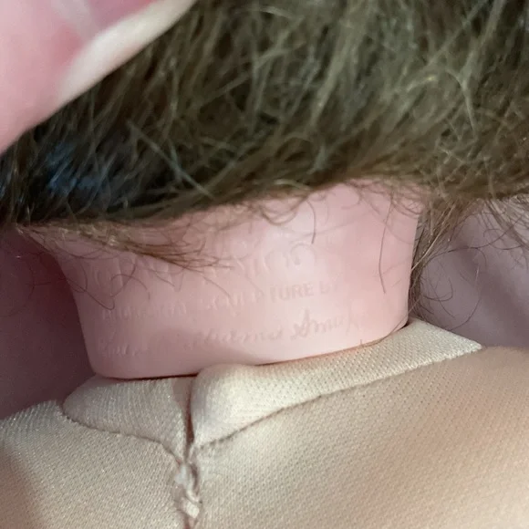 Adorable Baby Doll with Blue Eyes and Pink Outfit - Picture 7 of 7